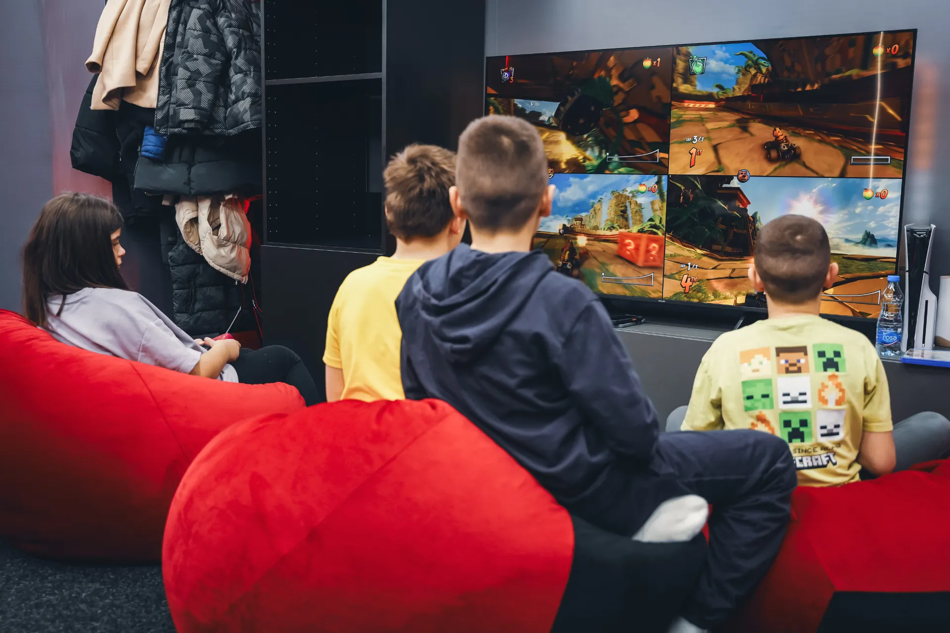Kids playing PlayStation